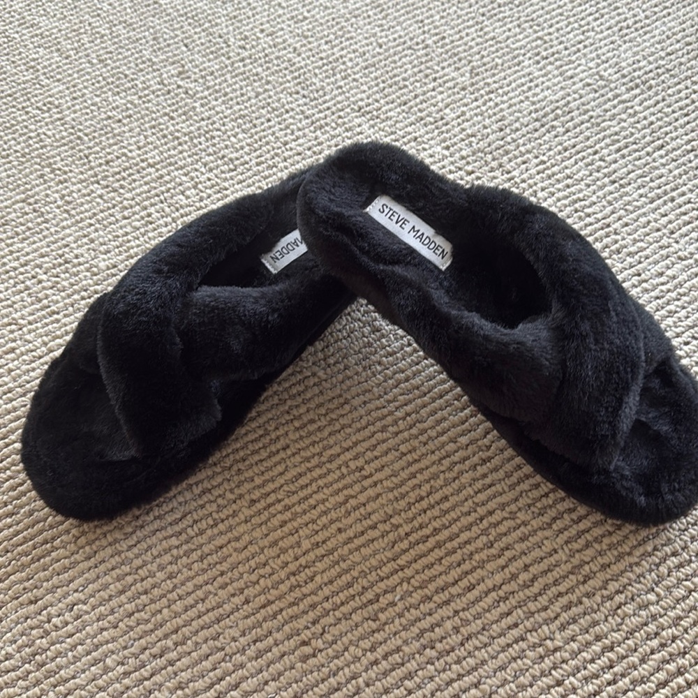 Steve Madden black fluffy slippers.